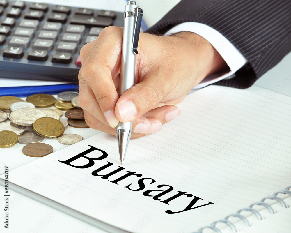 Hand with pen pointing to Bursary word on the paper