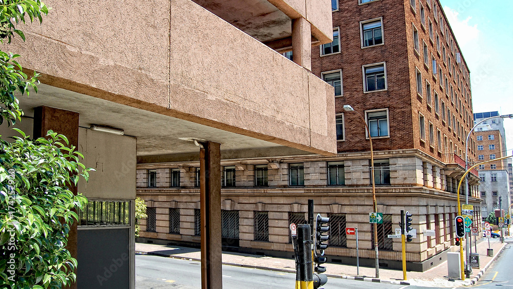 Streets of Johannesburg. High-rise buildings with blue sky background. Johannesburg is the biggest city of South Africa. Civil engineering. Johannesburg, South Africa - December 21, 2013